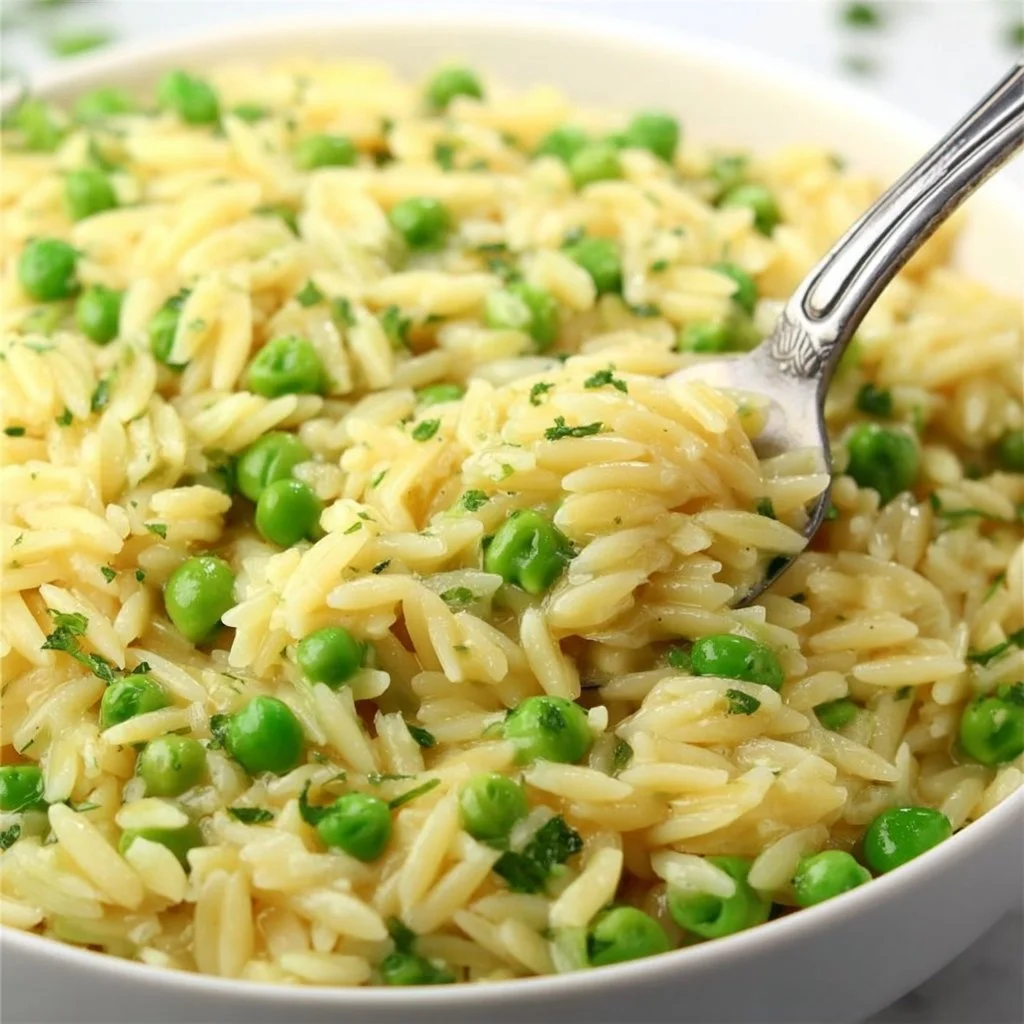 Creamy Parmesan Orzo and Peas dish served in a bowl