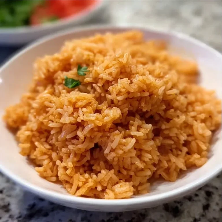 A delicious serving of traditional Spanish rice in a colorful bowl.
