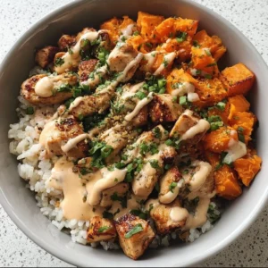 Delicious Chicken Rice Bowl with sweet potatoes, healthy meal option.