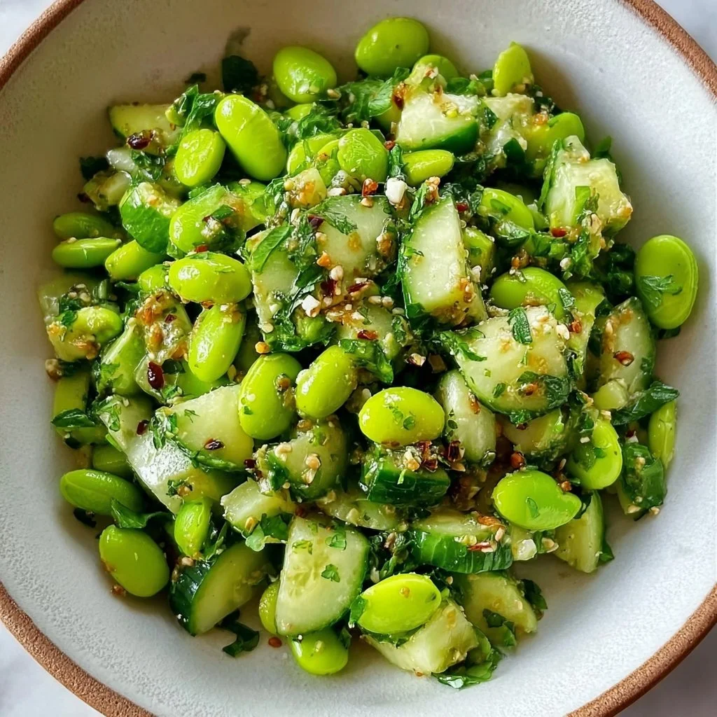 Crispy Cucumber Edamame Salad with vibrant green vegetables and dressing