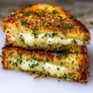 Delicious garlic bread grilled cheese sandwich with melted cheese and crispy crust