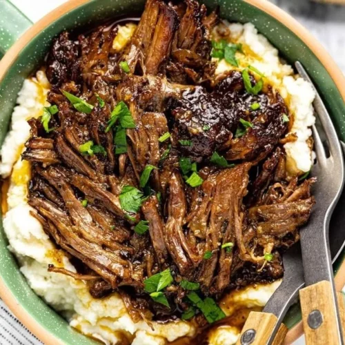 Deliciously braised beef chuck roast served with vegetables